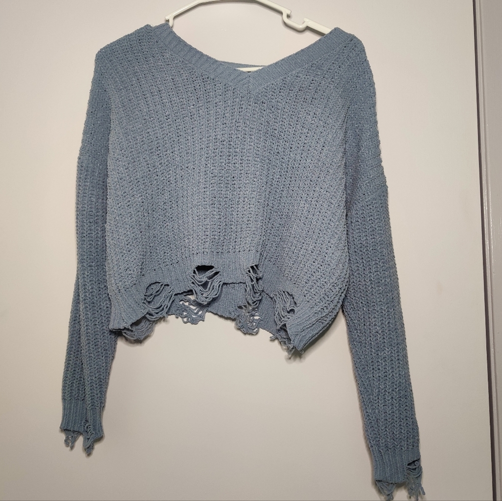 Blue V-neck sweater